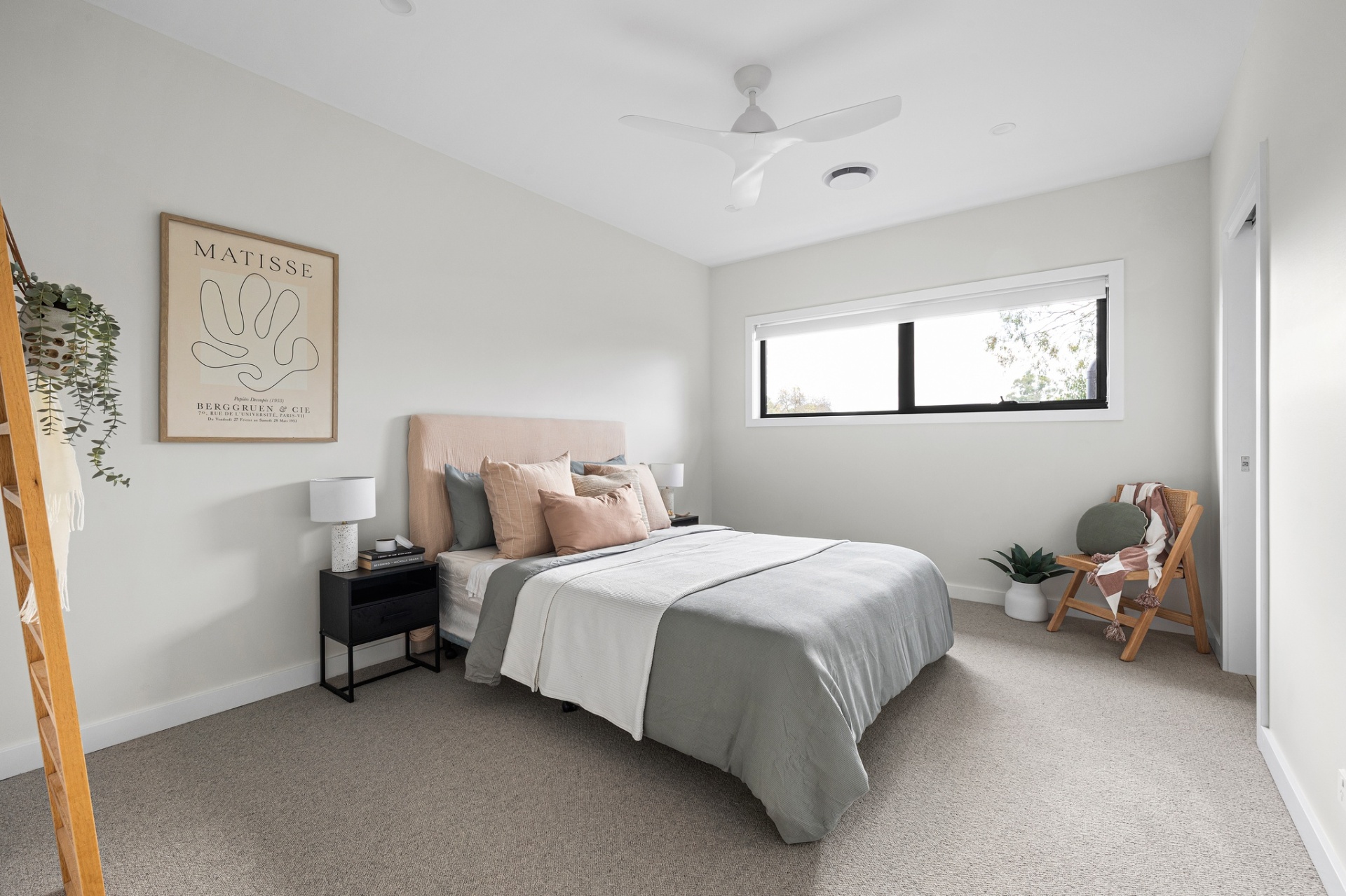Light-filled bedroom with soft styling